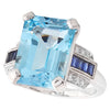 Sky blue topaz center with diamond and sapphire white gold ring