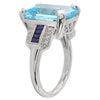 Sky blue topaz center with diamond and sapphire white gold ring