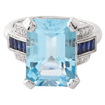 Sky blue topaz center with diamond and sapphire white gold ring