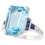 Sky blue topaz 14x10mm mount center with diamond and sapphire on white gold ring