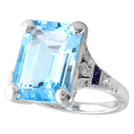 Emerald Cut Mount Set with A 14x10mm Sky Blue Topaz Center on White Gold Ring