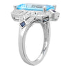 DIAMOND AND SAPPHIRE SET WITH A 14X8 MM SKY BLUE TOPAZ CENTER ON WHITE GOLD RING