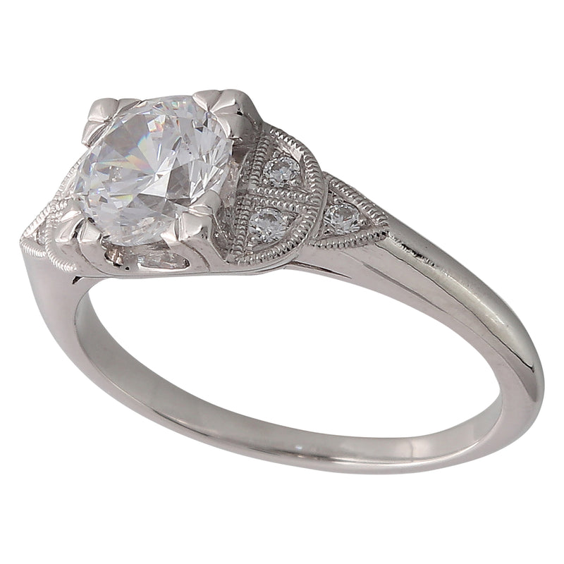DIAMOND MOUNT SET WITH A 6.5RD CENTER WHITE GOLD RING