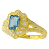 LONDON BLUE TOPAZ EMERALD CUT CENTER AND DIAMOND YELLOW GOLD RING