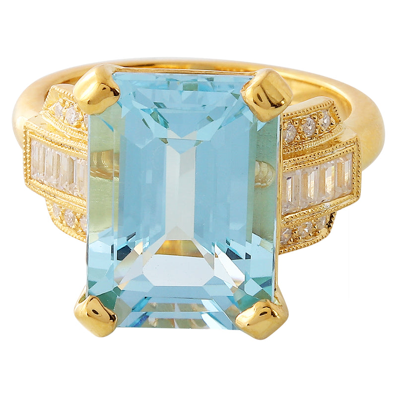 Sky blue topaz 14x10mm emerald cut center with diamond yellow gold ring