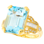 Diamond with Emerald Cut Sky Blue Topaz Center Mount Yellow Gold Ring