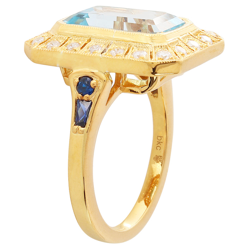 Sky blue topaz 12x8.2mm mount center with diamond and sapphire on yellow gold ring
