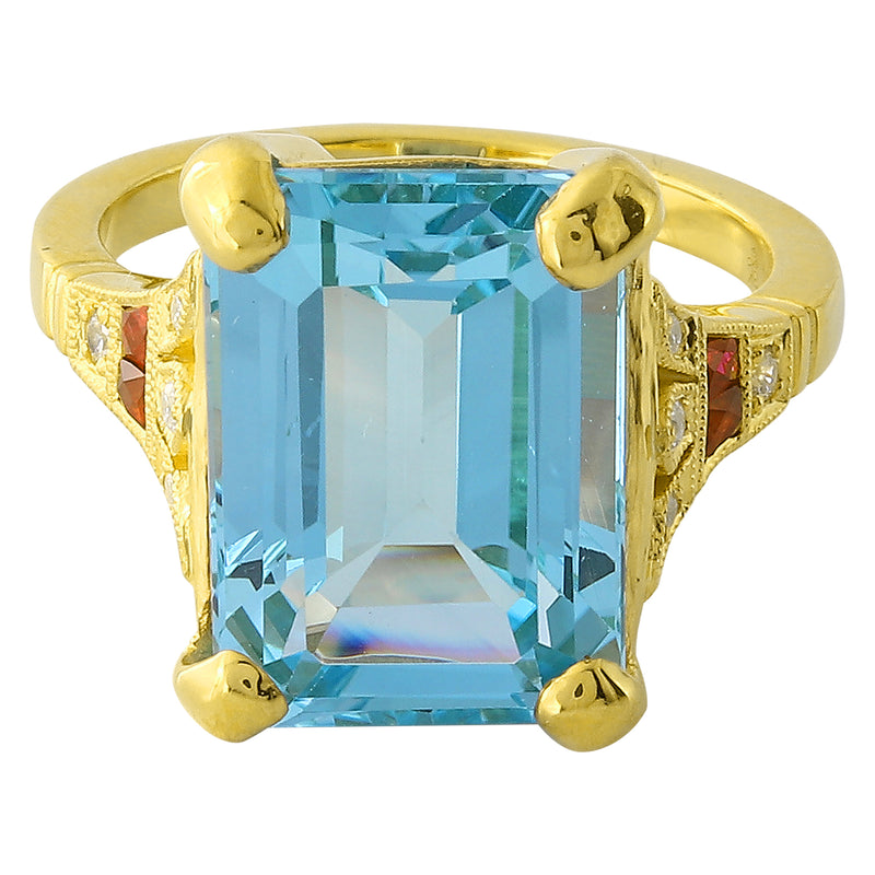 EMERALD CUT MOUNT SET WITH A 14X10MM SKY BLUE TOPAZ CENTER ON YELLOW GOLD RING