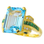 Blue Topaz Center With Tsavorite Side Stone and Diamonds Yellow Gold Ring