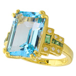 Blue Topaz Center With Tsavorite and Diamond Side on Yellow Gold Ring