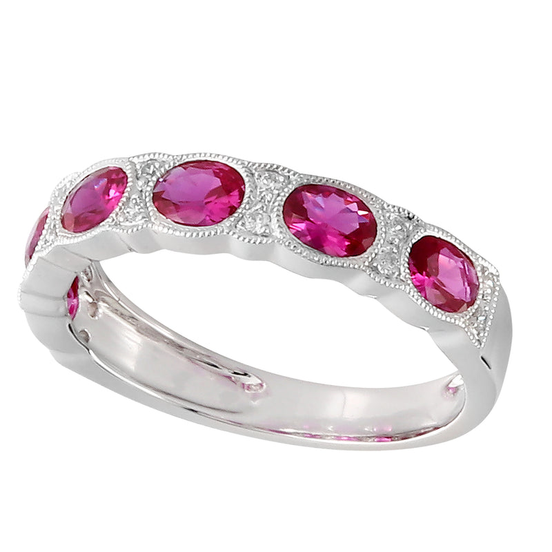 Oval Cut Ruby Set In Halfway Band