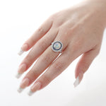 Oval Cut Opal Center, Diamond and Sapphire Halo Ring