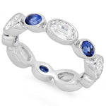 Oval Cut White and Blue Sapphire Wide Band